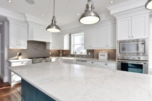 White quartz countertop in a kitchen.