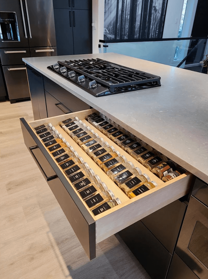 A photo of a modern custom drawer in a kitchen designed and installed by Sutcliffe Kitchens.