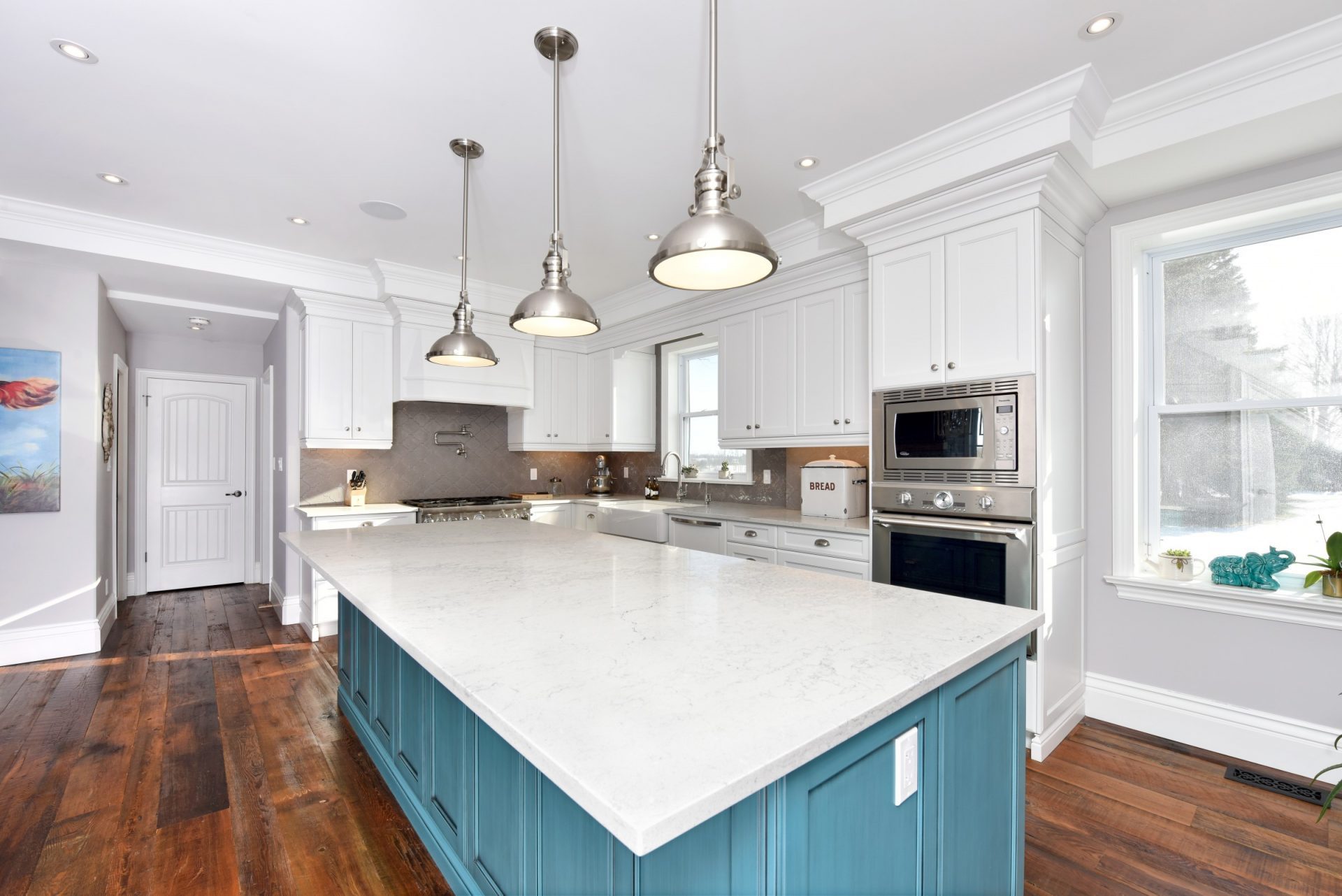 Classic farmhouse-style kitchen with white cabinetry